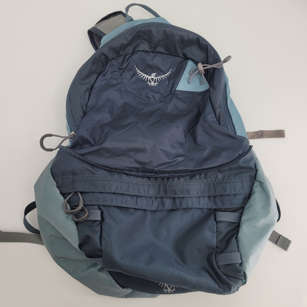 Osprey xena blue zipper compact hiking, weatherproof backpack.